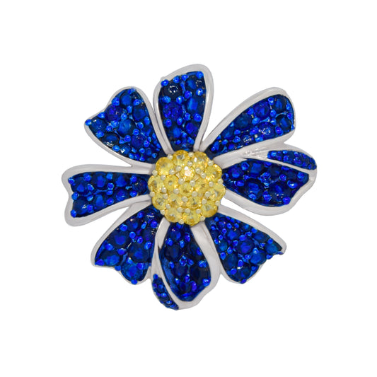Blue flower-shaped object with a yellow center on a white background