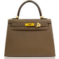 Brown handbag with gold hardware on a white background, collection-preview