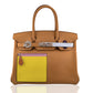 Brown handbag with a yellow patch on a white background, collection-preview
