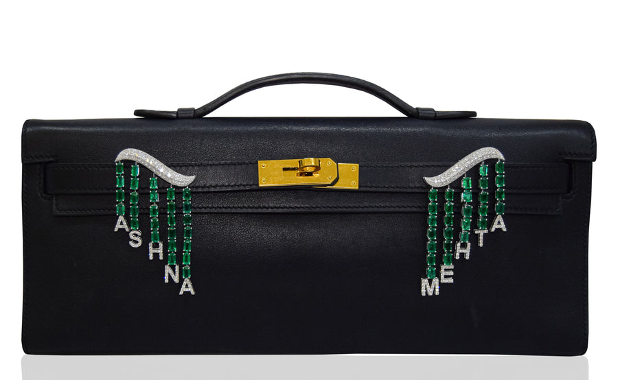 Black suitcase with decorative handles and text on a white background, collection-preview 