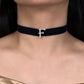 Black velvet choker with a silver 'F' pendant worn by a model.