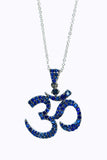 Ohm Necklace set in 18KT White Gold with Natural Blue Sapphires