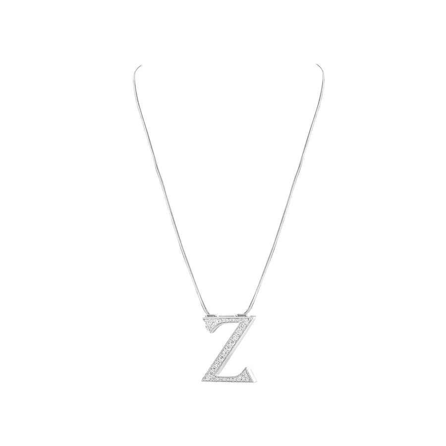 Silver necklace with 'Z' pendant on a white background
