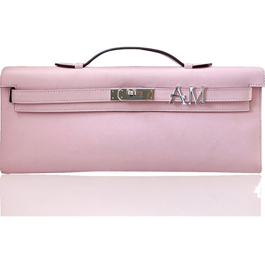 Pink handbag with a visible brand logo on a white background, collection-preview