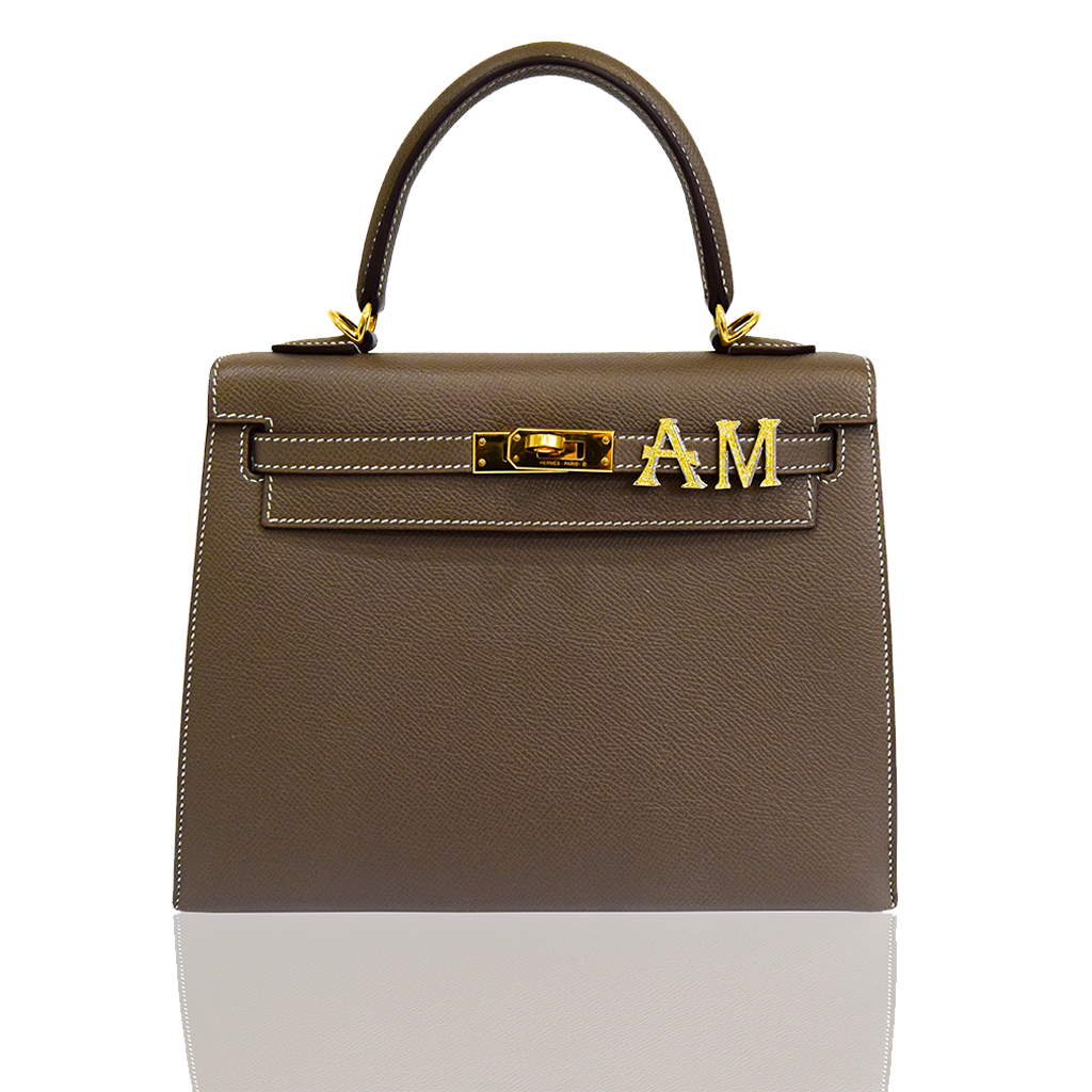 Brown handbag with gold hardware on a white background, collection-preview