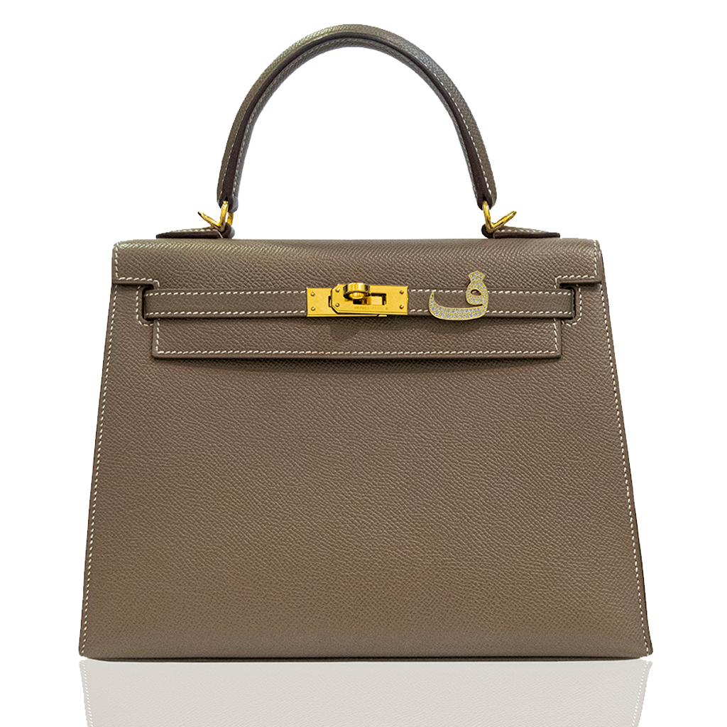 Brown handbag with gold hardware on a white background, collection-preview
