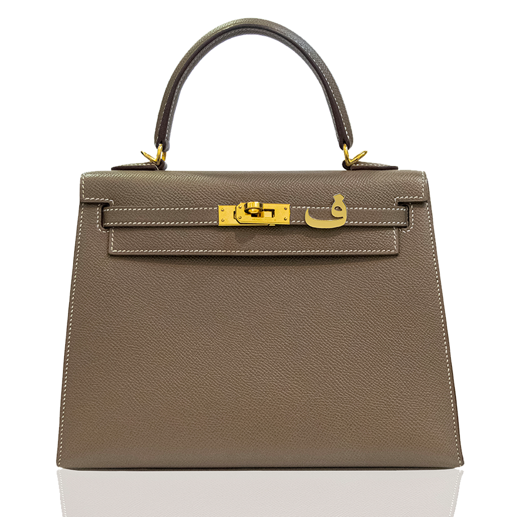 Brown handbag with gold hardware on a white background, collection-preview