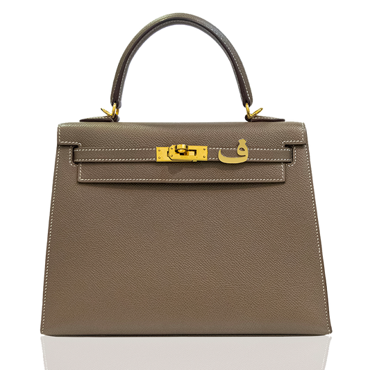Brown handbag with gold hardware on a white background, collection-preview