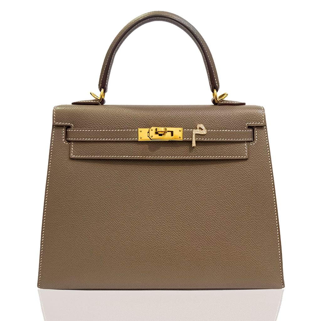 Brown handbag with gold hardware on a white background, collection-preview