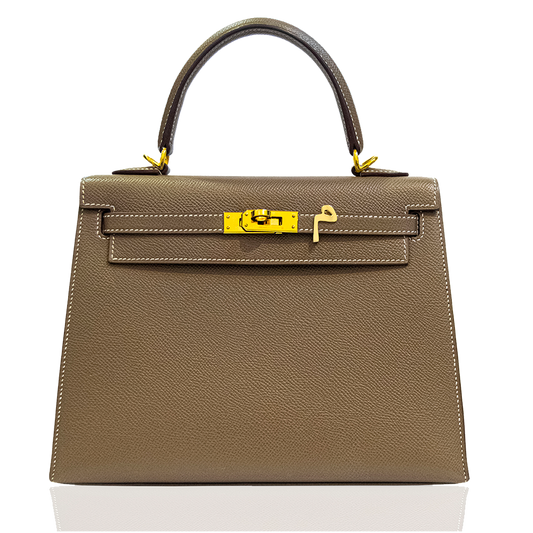 Brown handbag with gold hardware on a white background, collection-preview