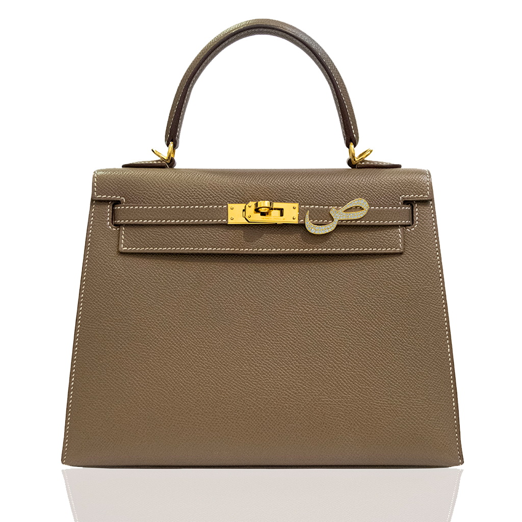 Brown handbag with gold hardware on a white background, collection-preview