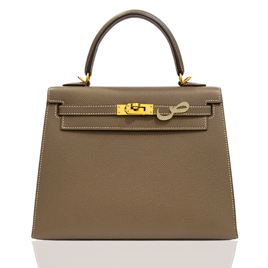 Brown handbag with gold hardware on a white background, collection-preview