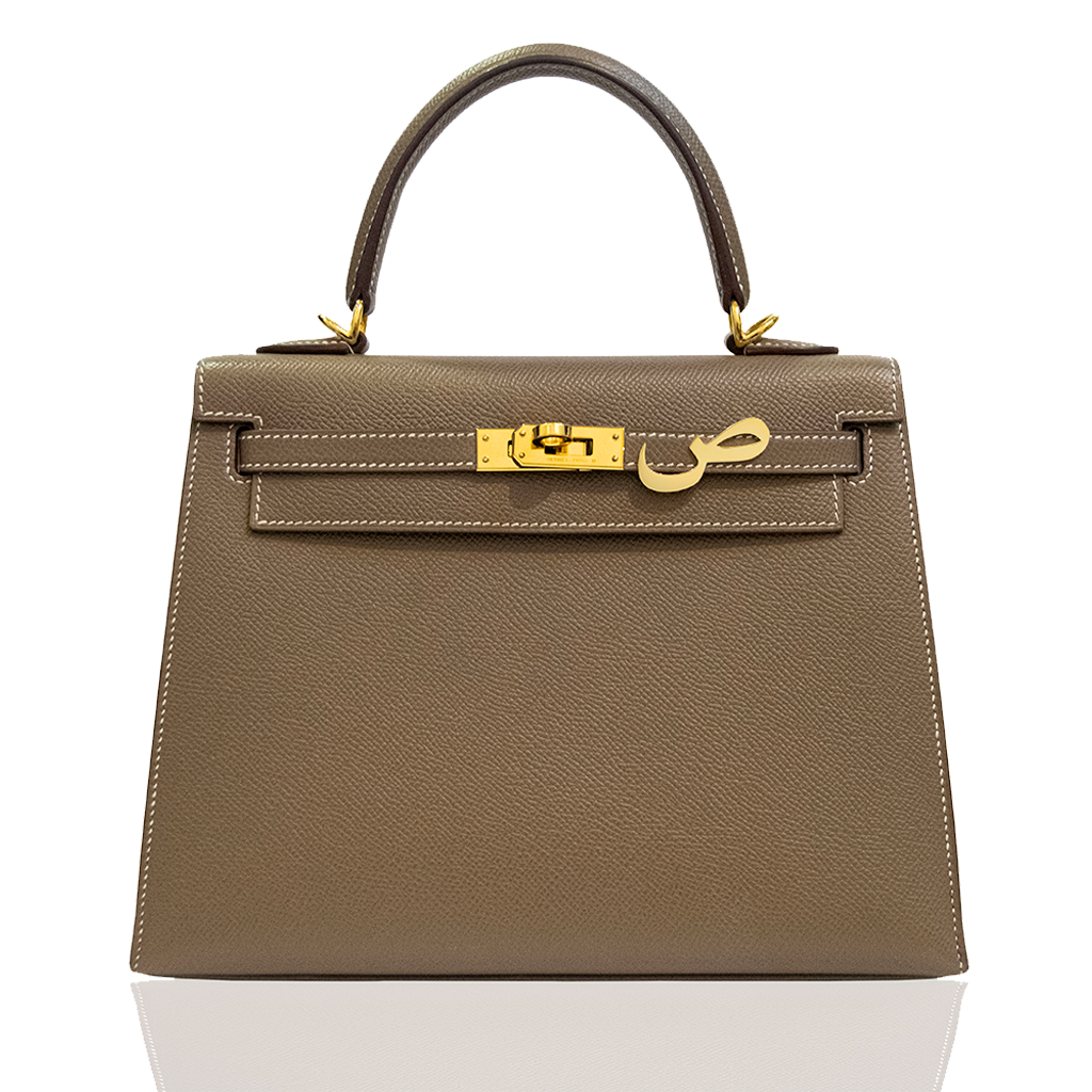 Brown handbag with gold hardware on a white background, collection-preview