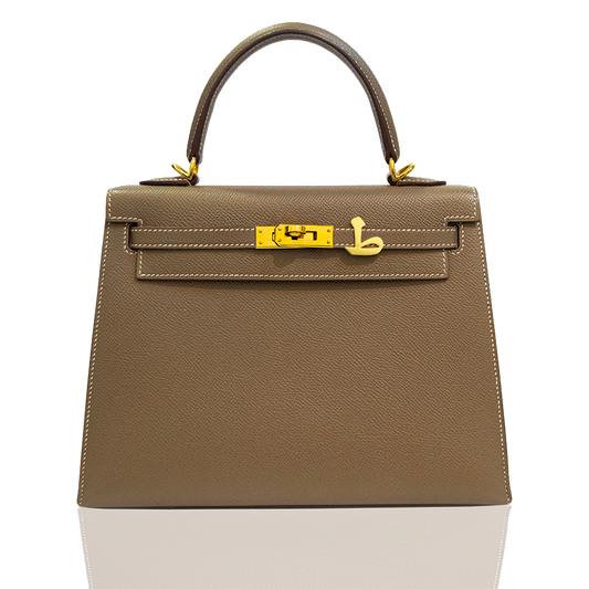 Brown handbag with gold hardware on a white background, collection-preview