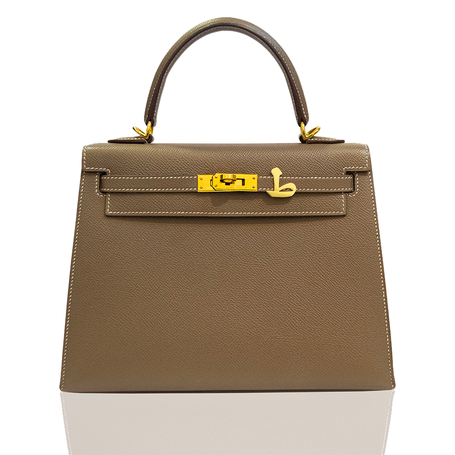Brown handbag with gold hardware on a white background, collection-preview